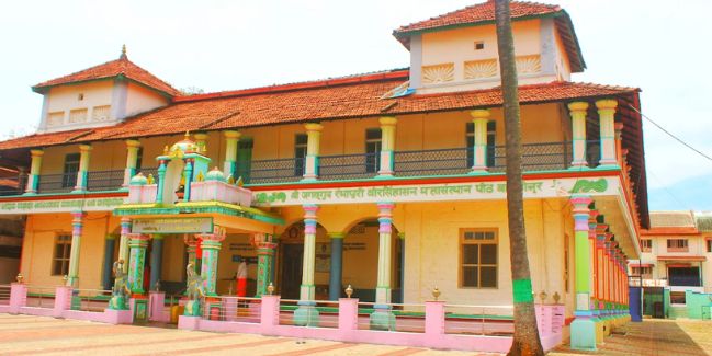 Hotel located at Sri Rambhapuri Mutt, a historic spiritual landmark in Balehonnur, Karnataka, cherished by devotees.