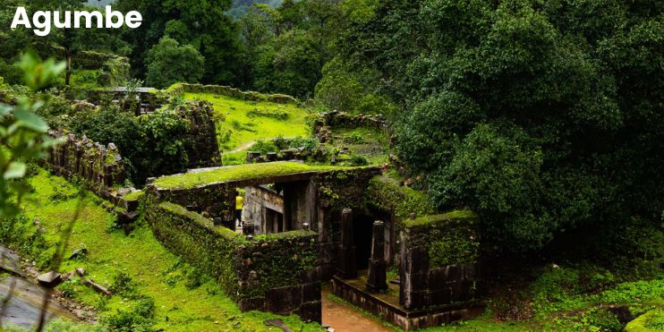 Ancient building ruins surrounded by lush greenery in Agumbe's enchanting rainforest. A glimpse of Karnataka's natural beauty.