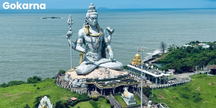 Gokarna, Karnataka: serene beaches, dramatic cliffs, and ancient temples, ideal for peaceful coastal retreats and monsoon visits.