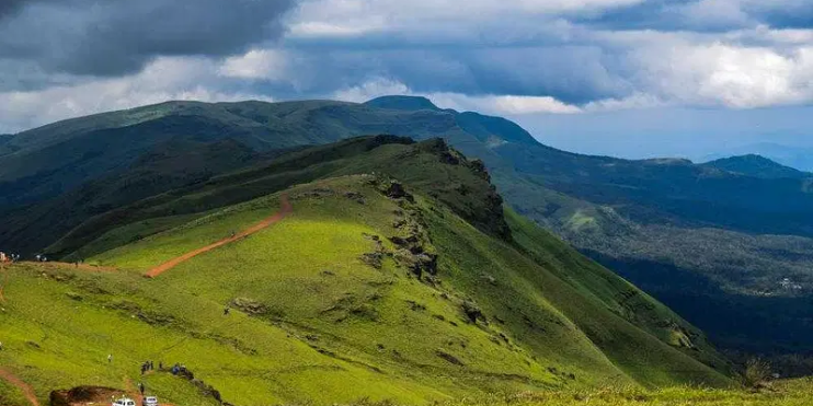 Lush green hills of Kerala, showcasing the serene landscape and natural beauty of this picturesque region.